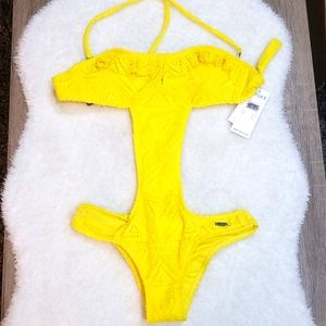Roxy bathing suit one piece size small bring yellow staps or strapless detailed